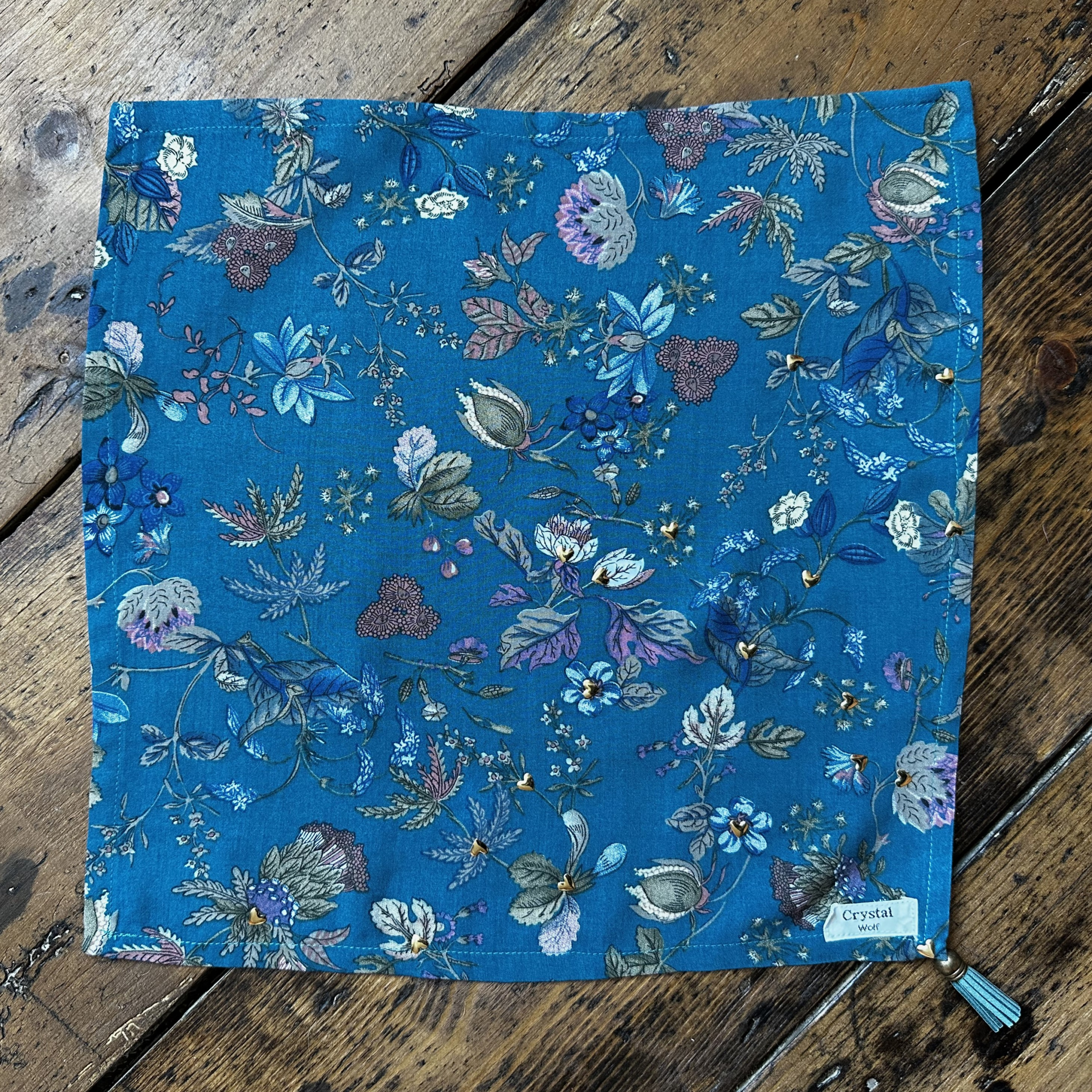 Teal floral dog bandana with gold hearts and tassel