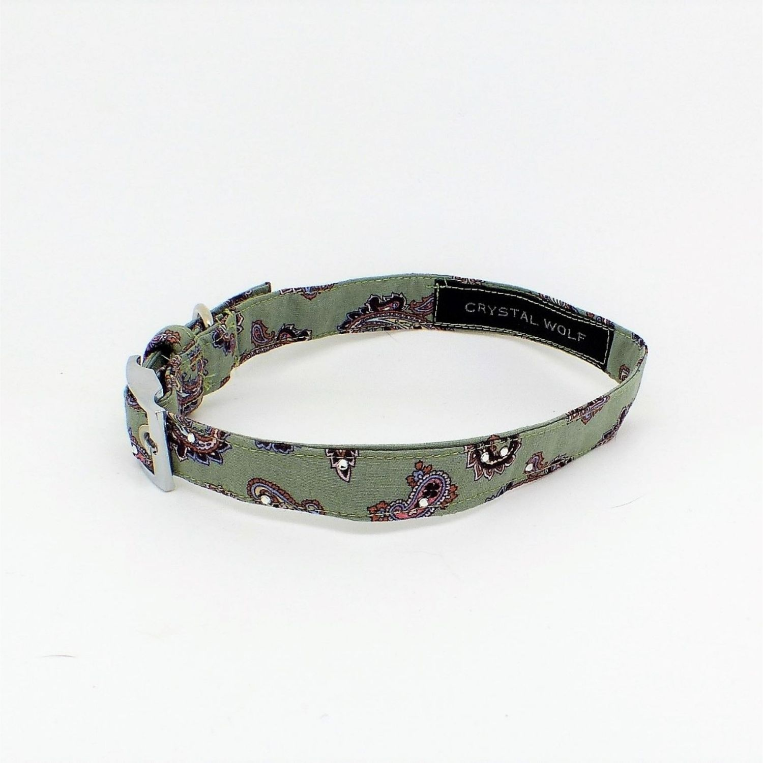 Side view of a handmade Paisley Small Dog Collar made from upcycled fabric, showcasing the colourful paisley print, adjustable fastening, and comfortable lightweight design.