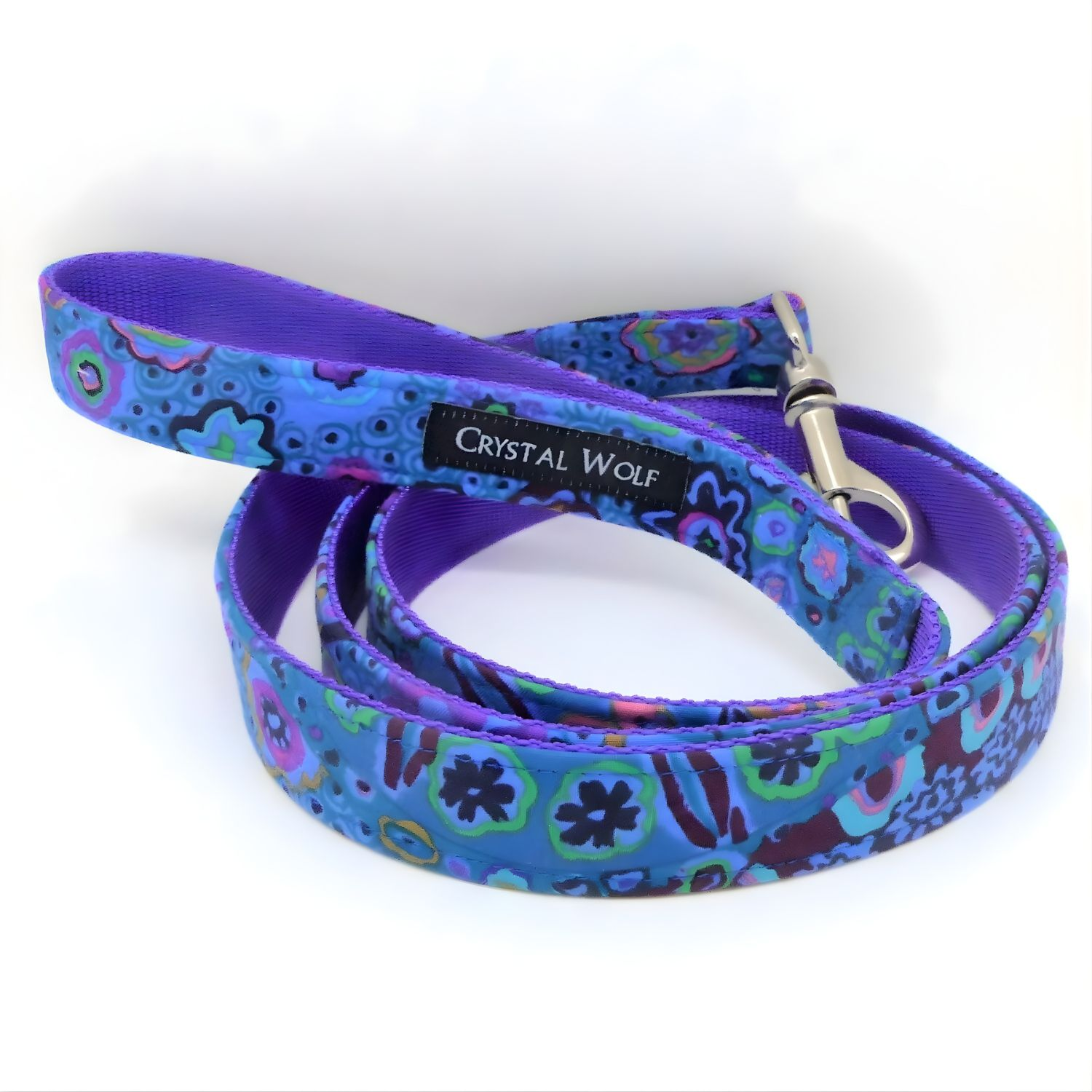 close up of blue floral dog lead coiled up with silver coloured hook